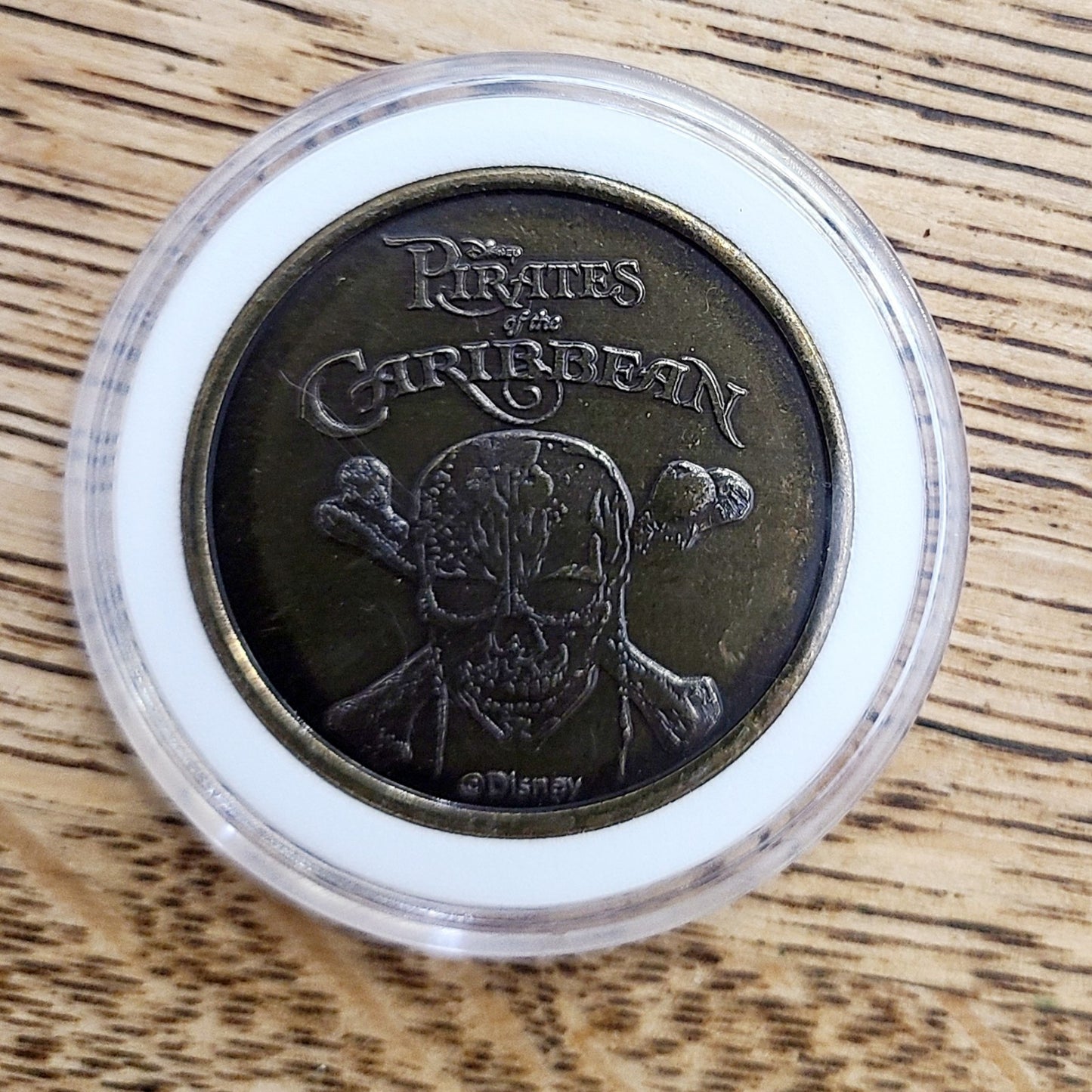 Disney Parks The Pirates of the Caribbean Bronze Medallion Mickey Coin Surrender
