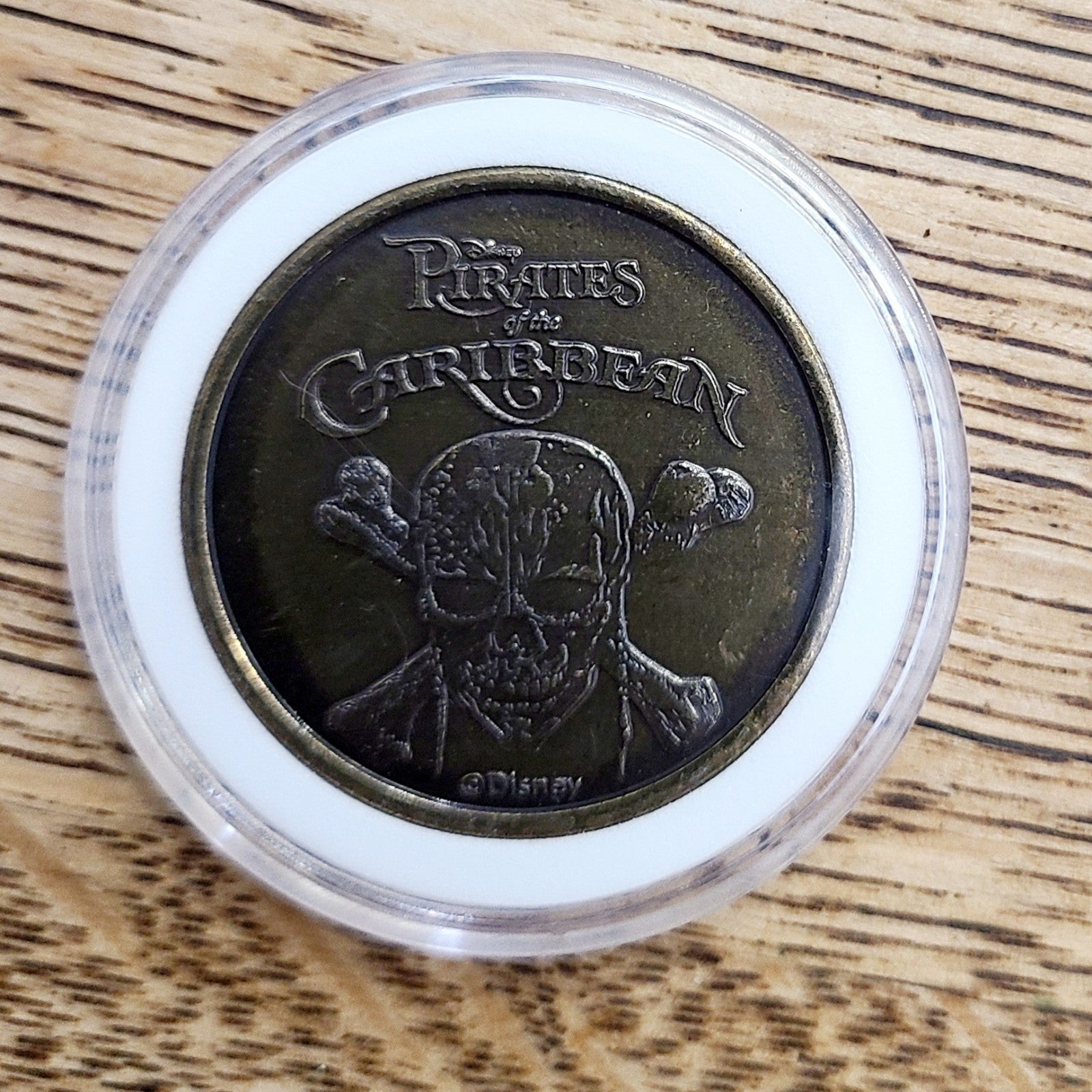 Disney Parks The Pirates of the Caribbean Bronze Medallion Mickey Coin Surrender