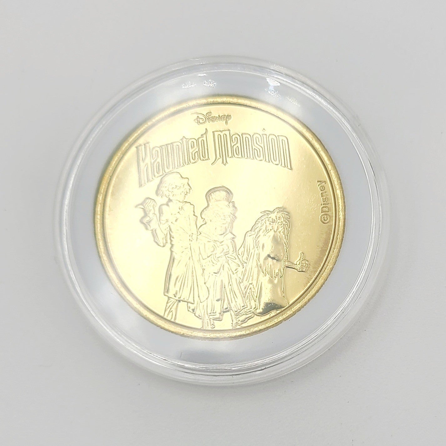 Haunted Mansion Hitchhiking Ghost Coin Disney Parks Golden Color Metal Medallion