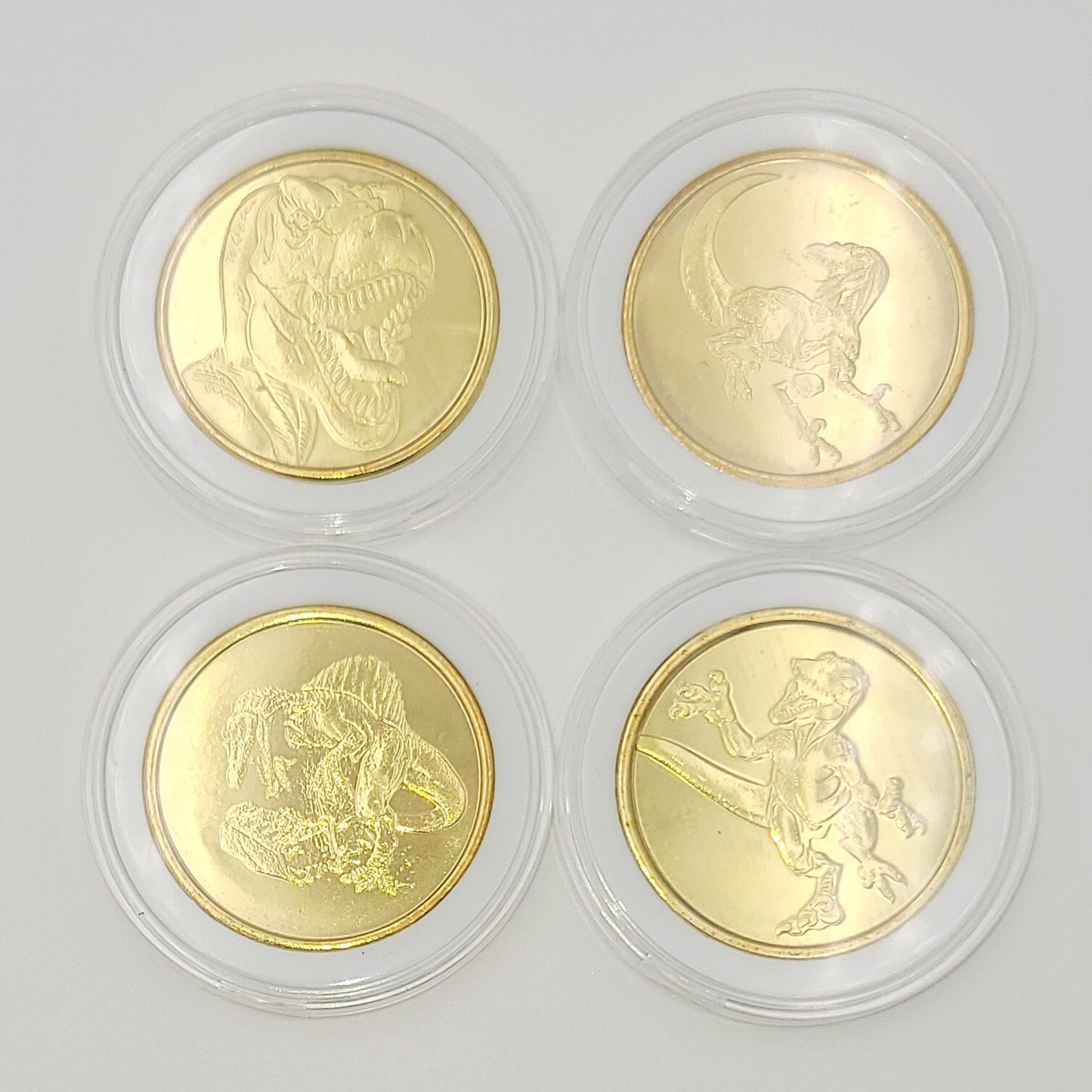 Set Of 4 Universal Studios Florida Coin Medallion 2024 Jurassic Park Dinosaur