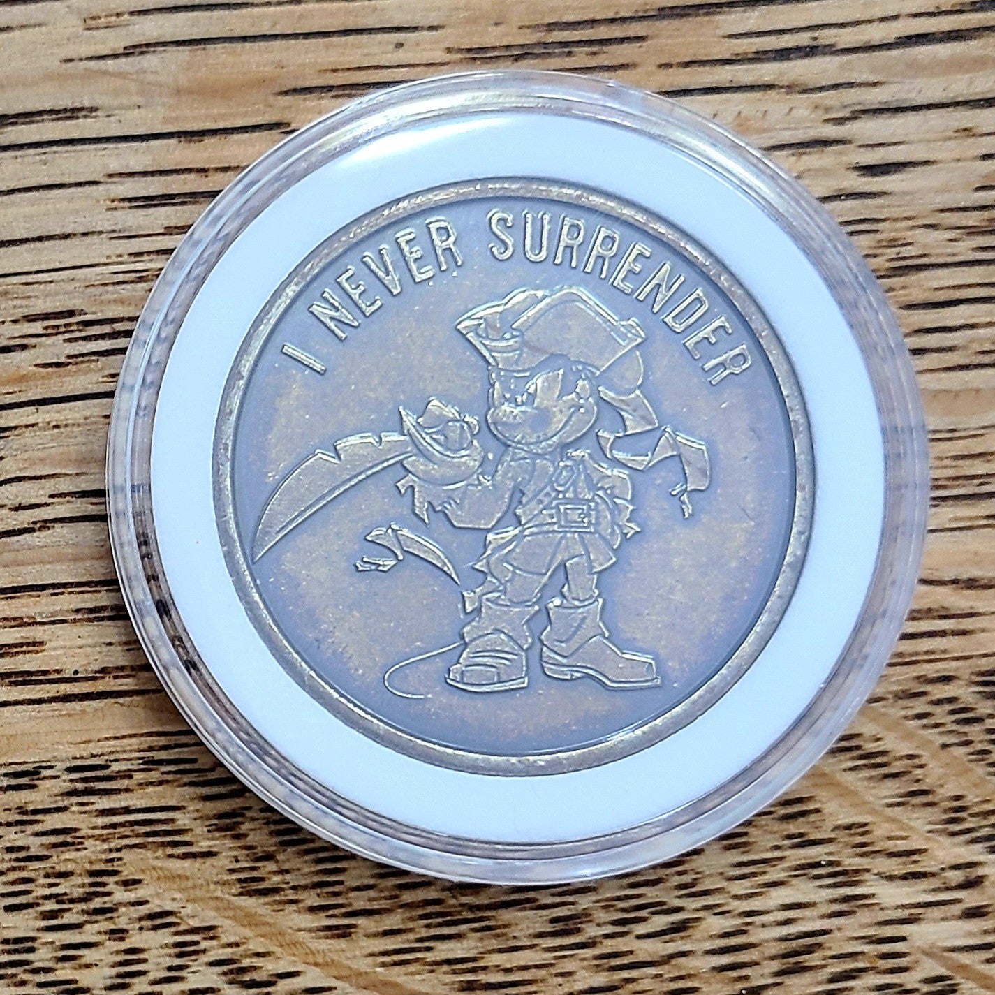 Disney Parks The Pirates of the Caribbean Bronze Medallion Mickey Coin Surrender