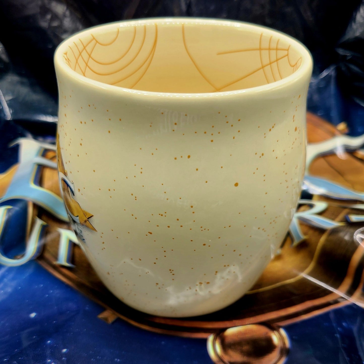 EPIC Universe Universal Studios Logo Emblem Ivory Coffee Mug Cup Gold Handle NEW