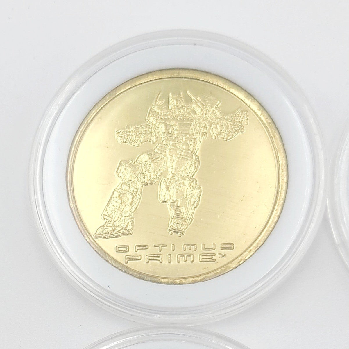 Set Of 4 Transformers Coin Medallion Bumblebee Optimus Prime Universal Studios