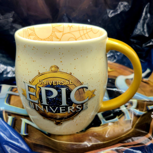 EPIC Universe Universal Studios Logo Emblem Ivory Coffee Mug Cup Gold Handle NEW