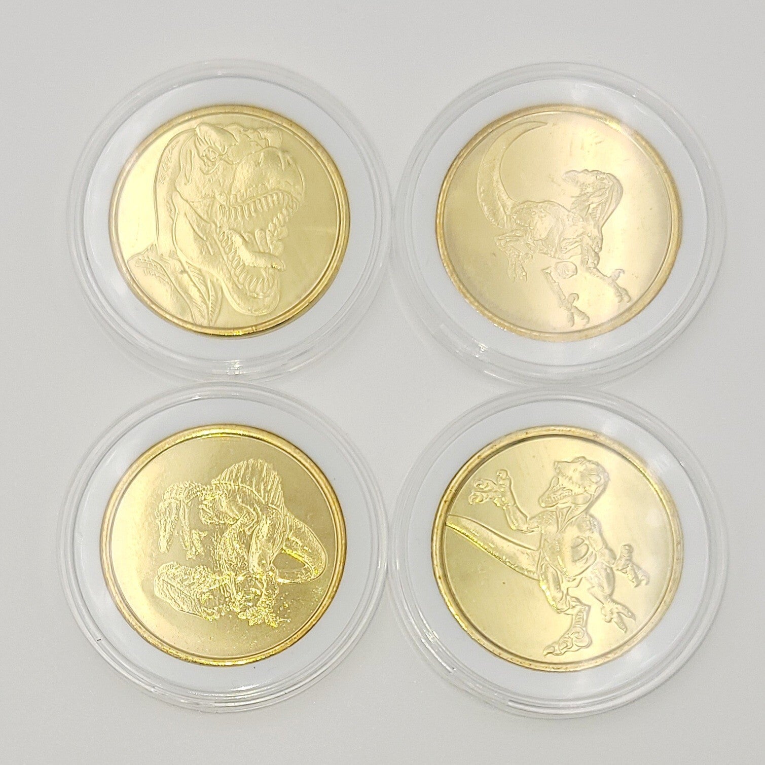 Set Of 4 Universal Studios Florida Coin Medallion 2024 Jurassic Park Dinosaur