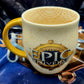 EPIC Universe Universal Studios Logo Emblem Ivory Coffee Mug Cup Gold Handle NEW