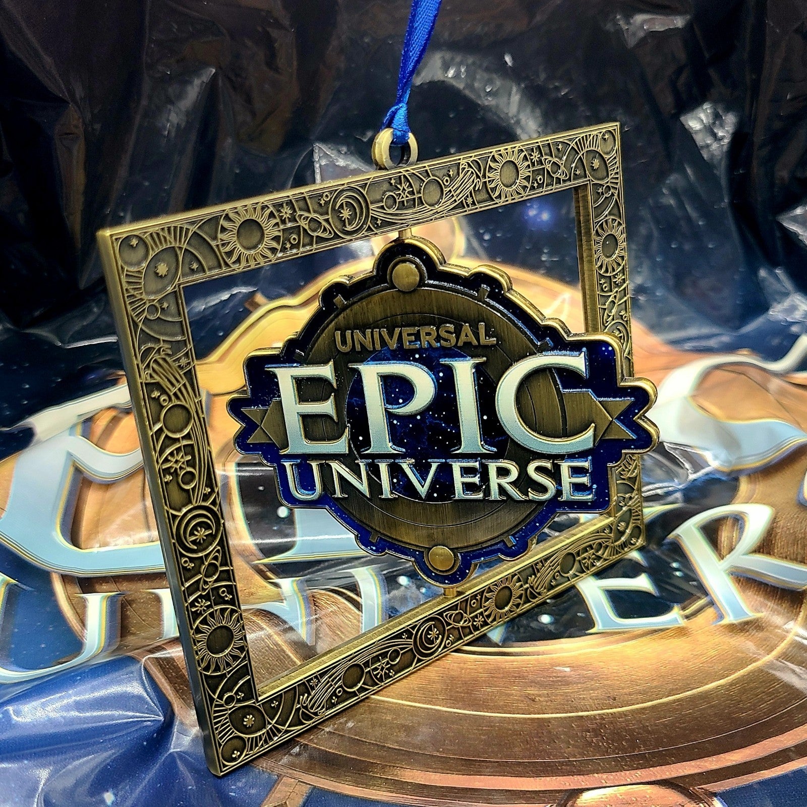 EPIC Universe Emblem Logo Spinner Metal Ornament Universal Studios Orlando Spin