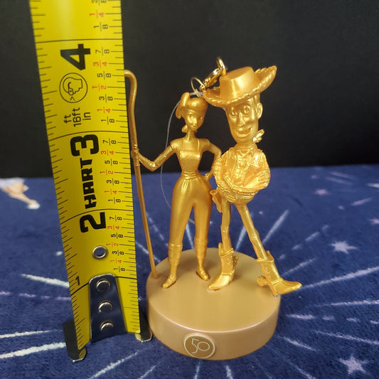 2021 Disney Parks 50th Anniversary Gold Statue Woody Bo Peep Christmas Ornament
