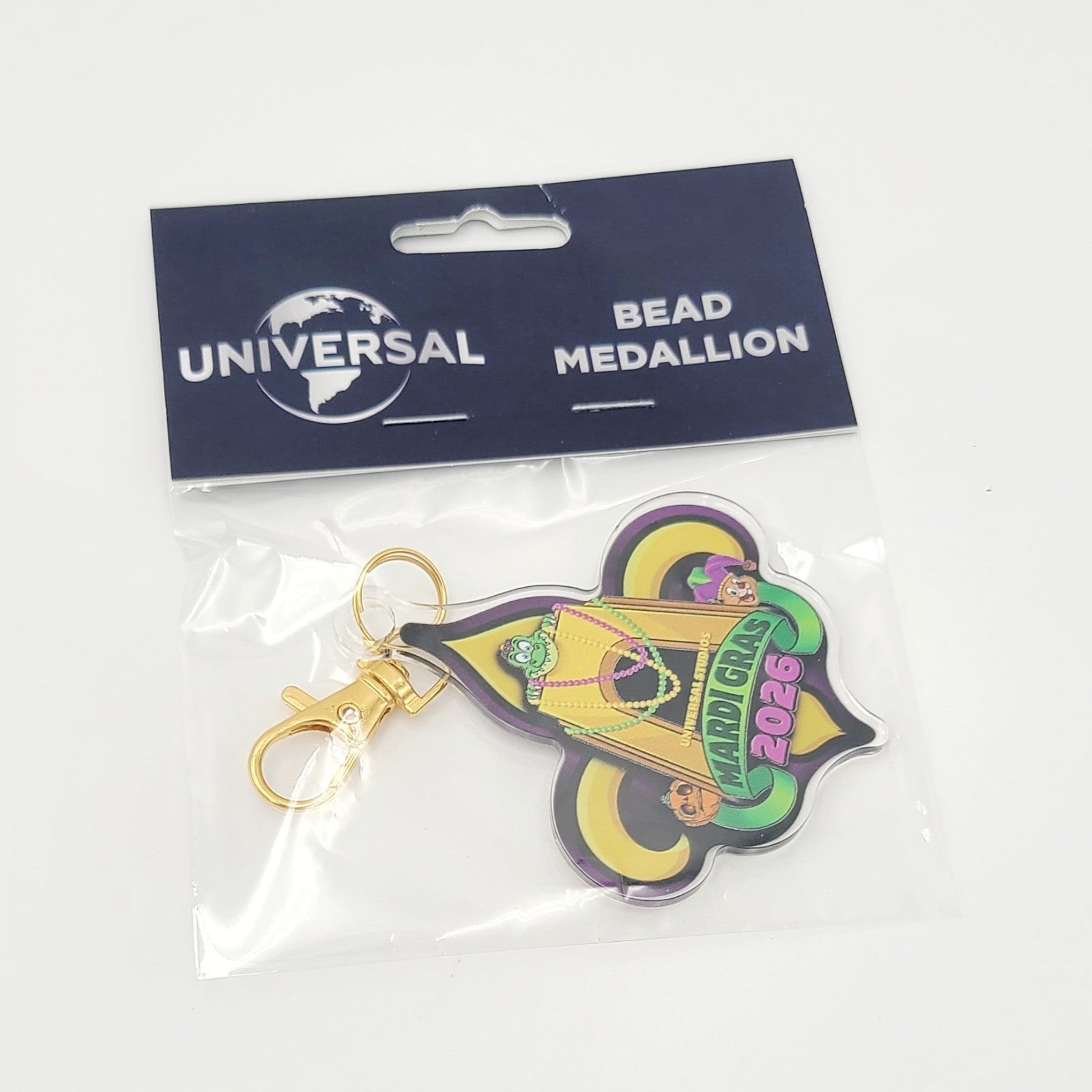 2026 Universal Studios Mardi Gras Bead Medallion King Gator Alligator Keychain