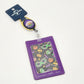 2026 Universal Studios Mardi Gras Badge Reel ID Holder Parade Art Gator Pumpkin