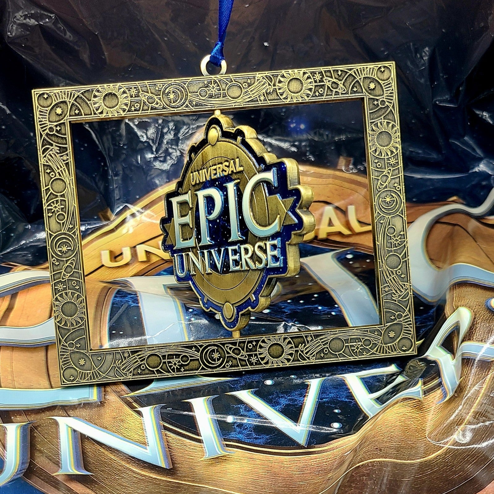 EPIC Universe Emblem Logo Spinner Metal Ornament Universal Studios Orlando Spin